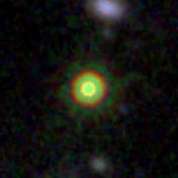 Colour composite: F444W red, F356W green, F277W blue, 3.2 arcsec across, north up