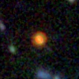 Colour composite: F444W red, F356W green, F277W blue, 3.2 arcsec across, north up