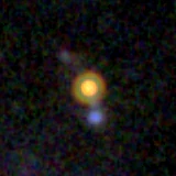 Colour composite: F444W red, F356W green, F277W blue, 3.2 arcsec across, north up