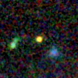 Colour composite: F444W red, F356W green, F277W blue, 3.2 arcsec across, north up