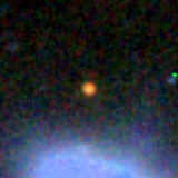 Colour composite: F444W red, F356W green, F277W blue, 3.2 arcsec across, north up