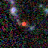 Colour composite: F444W red, F356W green, F277W blue, 3.2 arcsec across, north up