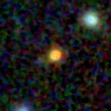 Colour composite: F444W red, F356W green, F277W blue, 3.2 arcsec across, north up