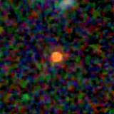Colour composite: F444W red, F356W green, F277W blue, 3.2 arcsec across, north up