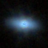 Colour composite: F444W red, F356W green, F277W blue, 3.2 arcsec across, north up