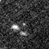 F115W image, 3.2 arcsec across, north up