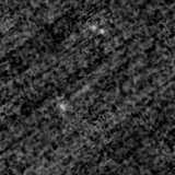 F115W image, 3.2 arcsec across, north up