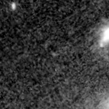 F115W image, 3.2 arcsec across, north up