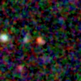 Colour composite: F444W red, F356W green, F277W blue, 3.2 arcsec across, north up