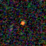 Colour composite: F444W red, F356W green, F277W blue, 3.2 arcsec across, north up