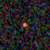 Colour composite: F444W red, F356W green, F277W blue, 3.2 arcsec across, north up
