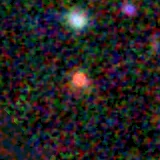 Colour composite: F444W red, F356W green, F277W blue, 3.2 arcsec across, north up