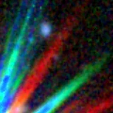 Colour composite: F444W red, F356W green, F277W blue, 3.2 arcsec across, north up