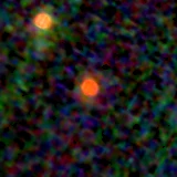Colour composite: F444W red, F356W green, F277W blue, 3.2 arcsec across, north up