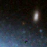 Colour composite: F444W red, F356W green, F277W blue, 3.2 arcsec across, north up