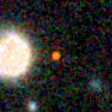 Colour composite: F444W red, F356W green, F277W blue, 3.2 arcsec across, north up