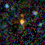 Colour composite: F444W red, F356W green, F277W blue, 3.2 arcsec across, north up