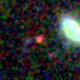 Colour composite: F444W red, F356W green, F277W blue, 3.2 arcsec across, north up