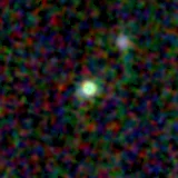 Colour composite: F444W red, F356W green, F277W blue, 3.2 arcsec across, north up