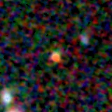 Colour composite: F444W red, F356W green, F277W blue, 3.2 arcsec across, north up