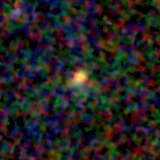 Colour composite: F444W red, F356W green, F277W blue, 3.2 arcsec across, north up