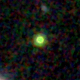Colour composite: F444W red, F356W green, F277W blue, 3.2 arcsec across, north up