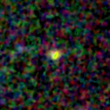 Colour composite: F444W red, F356W green, F277W blue, 3.2 arcsec across, north up