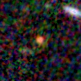Colour composite: F444W red, F356W green, F277W blue, 3.2 arcsec across, north up