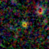 Colour composite: F444W red, F356W green, F277W blue, 3.2 arcsec across, north up