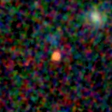 Colour composite: F444W red, F356W green, F277W blue, 3.2 arcsec across, north up