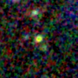 Colour composite: F444W red, F356W green, F277W blue, 3.2 arcsec across, north up