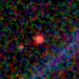 Colour composite: F444W red, F356W green, F277W blue, 3.2 arcsec across, north up