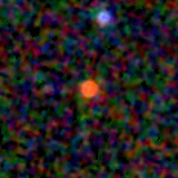 Colour composite: F444W red, F356W green, F277W blue, 3.2 arcsec across, north up