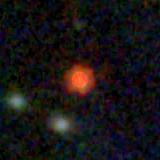 Colour composite: F444W red, F356W green, F277W blue, 3.2 arcsec across, north up