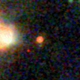 Colour composite: F444W red, F356W green, F277W blue, 3.2 arcsec across, north up