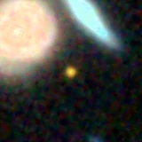 Colour composite: F444W red, F356W green, F277W blue, 3.2 arcsec across, north up