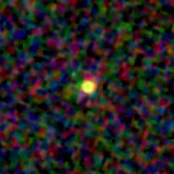 Colour composite: F444W red, F356W green, F277W blue, 3.2 arcsec across, north up