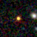Colour composite: F444W red, F356W green, F277W blue, 3.2 arcsec across, north up
