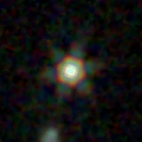 Colour composite: F444W red, F356W green, F277W blue, 3.2 arcsec across, north up