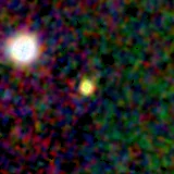 Colour composite: F444W red, F356W green, F277W blue, 3.2 arcsec across, north up