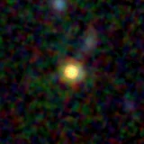 Colour composite: F444W red, F356W green, F277W blue, 3.2 arcsec across, north up