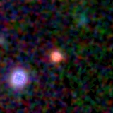 Colour composite: F444W red, F356W green, F277W blue, 3.2 arcsec across, north up