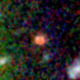 Colour composite: F444W red, F356W green, F277W blue, 3.2 arcsec across, north up