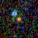 Colour composite: F444W red, F356W green, F277W blue, 3.2 arcsec across, north up