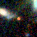 Colour composite: F444W red, F356W green, F277W blue, 3.2 arcsec across, north up