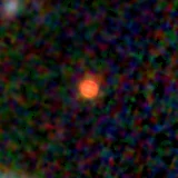 Colour composite: F444W red, F356W green, F277W blue, 3.2 arcsec across, north up
