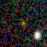 Colour composite: F444W red, F356W green, F277W blue, 3.2 arcsec across, north up