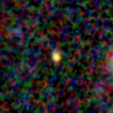 Colour composite: F444W red, F356W green, F277W blue, 3.2 arcsec across, north up