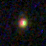 Colour composite: F444W red, F356W green, F277W blue, 3.2 arcsec across, north up