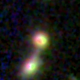 Colour composite: F444W red, F356W green, F277W blue, 3.2 arcsec across, north up